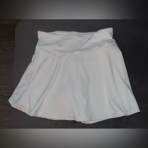 SOLD! Tennis/skater skirtsx2. Wht&Blk. Buy by 3/31 or will be donated.